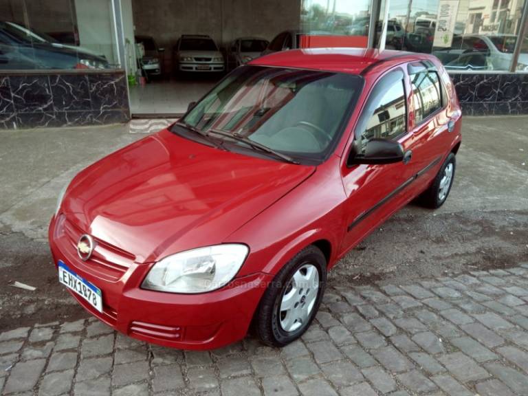 CHEVROLET - CELTA - 2009/2009 - Vermelha - R$ 21.900,00